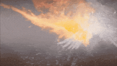a close up of a flame coming out of a pipe