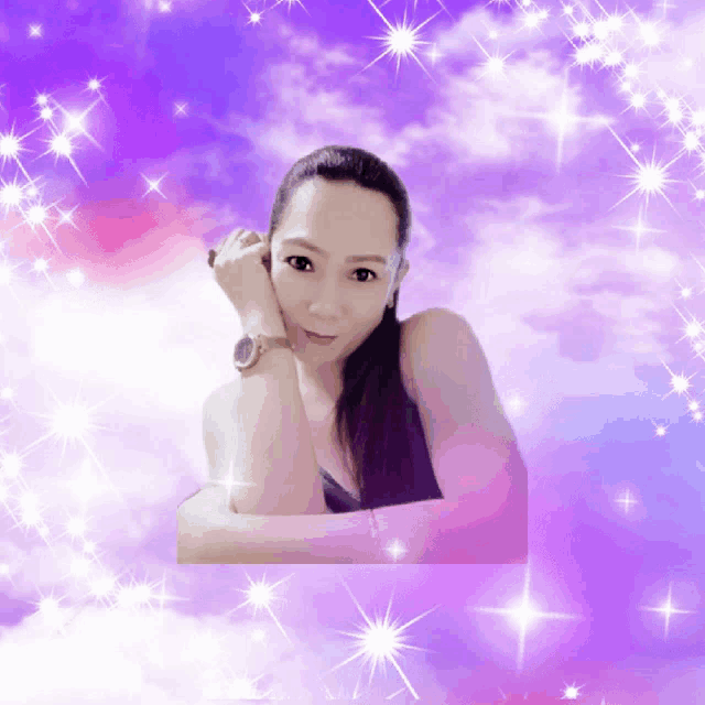 a woman wearing a watch is surrounded by sparkles