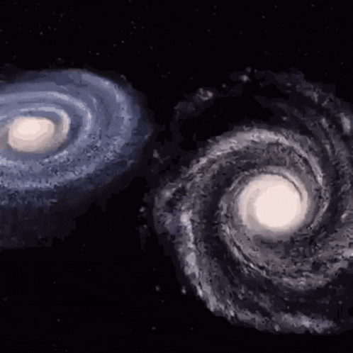two spiral galaxies are moving in opposite directions in space