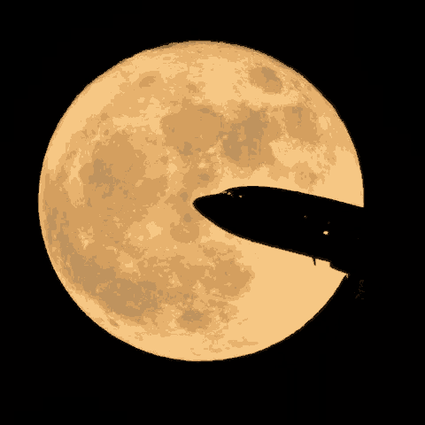 a full moon against a black sky
