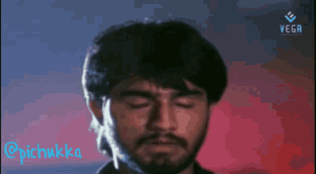 a close up of a man 's face with the hashtag pichukka