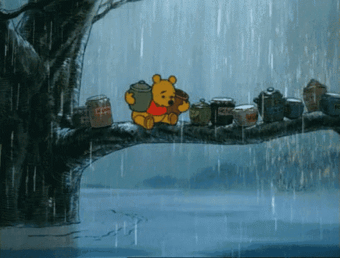 a cartoon of winnie the pooh sitting on a tree branch in the rain