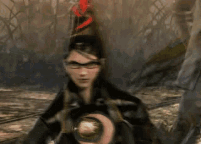 a blurry picture of a woman in a video game with a hat on her head .