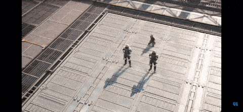 a group of soldiers are standing on a concrete floor with the letters qu on the bottom