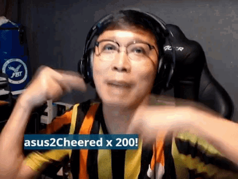a man wearing headphones says asus2cheered x200