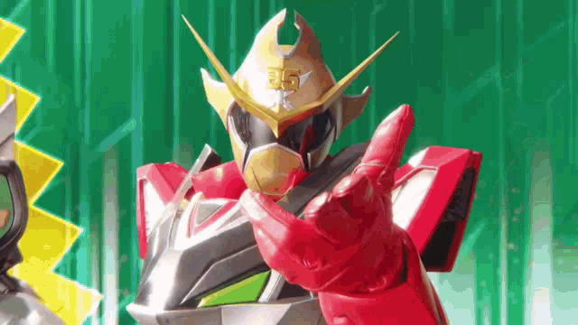 a robot with a helmet and gloves is giving a thumbs up .