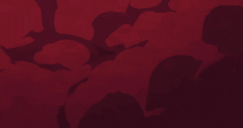 a cartoon character is laying on the ground in a bloody area