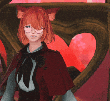 a girl with red hair making a heart shape with her hands