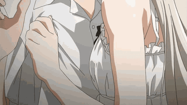 a close up of a person 's arm and chest