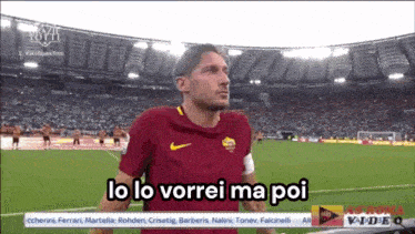 a soccer player is standing on a field and says lo lo vorrei ma poi