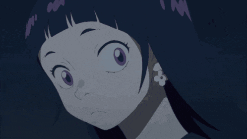 a girl with a surprised look on her face is wearing earrings