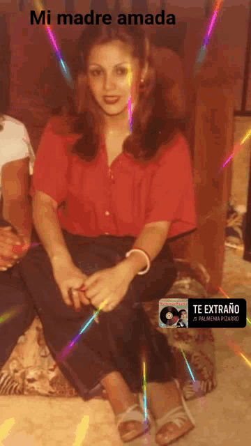 a woman in a red shirt sits on a couch with the words " mi madre amada " written above her