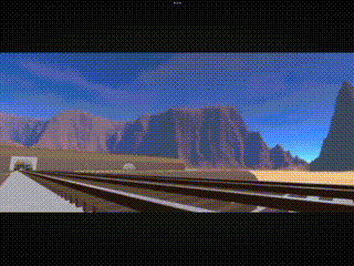 a train track with mountains in the background and a tunnel