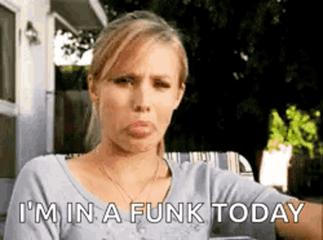 a woman is making a funny face and saying `` i 'm in a funk today ''