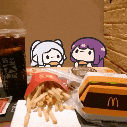 two cartoon characters are sitting at a table with french fries and a mcdonalds hamburger