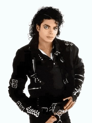 a man wearing a black jacket with the letter a on the sleeves