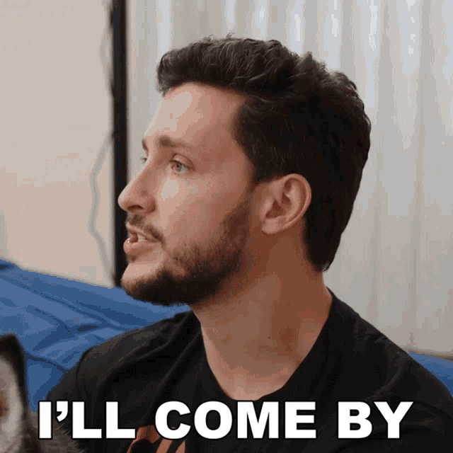 a man says i 'll come by in a black shirt