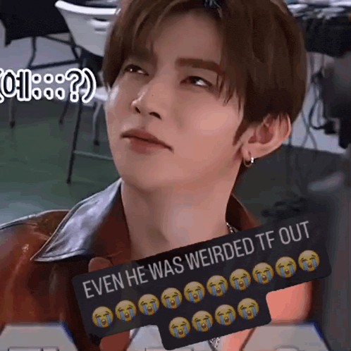 a close up of a man 's face with a sign that says even he was weirded tf out