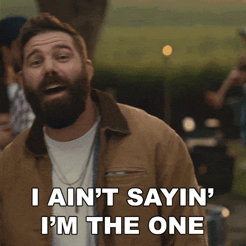 a man with a beard says i ain t sayin ' i 'm the one