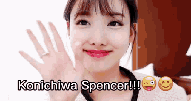 a woman waving her hand with the words konichiwa spencer written above her