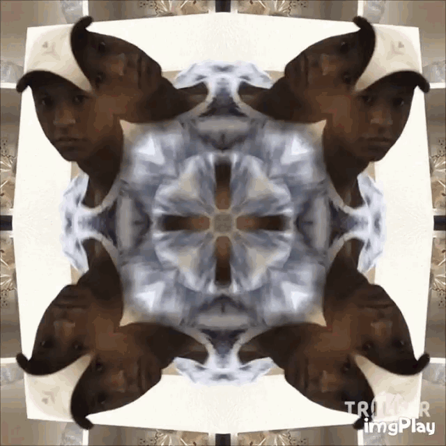 a kaleidoscope of a man 's face with the words trigger imgplay below it