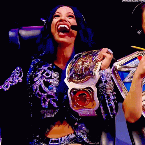 Sasha Banks Womens Tag Team Champions GIF - Sasha Banks Womens Tag Team Champions Laugh GIFs
