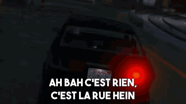 a blurred image of a car with the words ah bah c'est rien c'est la rue hein on the bottom