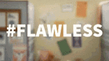 a blurred image of a room with the words `` flawless '' written on the wall .