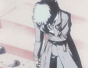 a man in a trench coat is kneeling down on a set of stairs .