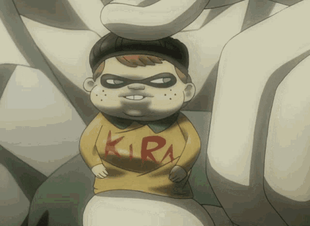 a child wearing a yellow shirt that says kira on it
