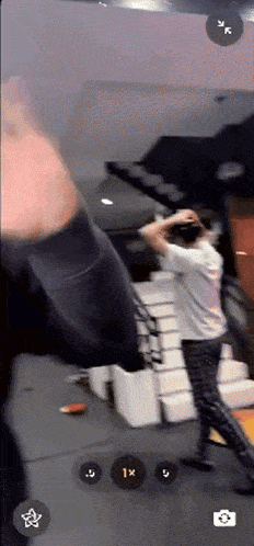 a person is taking a picture of a staircase while wearing an oculus headset