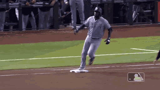 a san diego baseball player is running to base