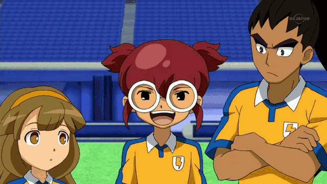 a group of anime characters are standing next to each other and one has a letter b on his shirt