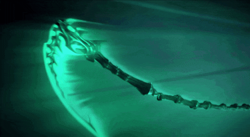 a green background with a glowing object in the center