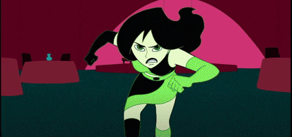 a cartoon of kim possible in a purple dress standing on a red carpet