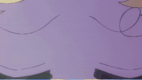 a close up of a cartoon character 's eyes with the number 9 in the middle