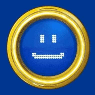 a gold ring with a blue background and a smiley face on it .