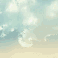 a re / max dreams ad with a hot air balloon flying in the sky