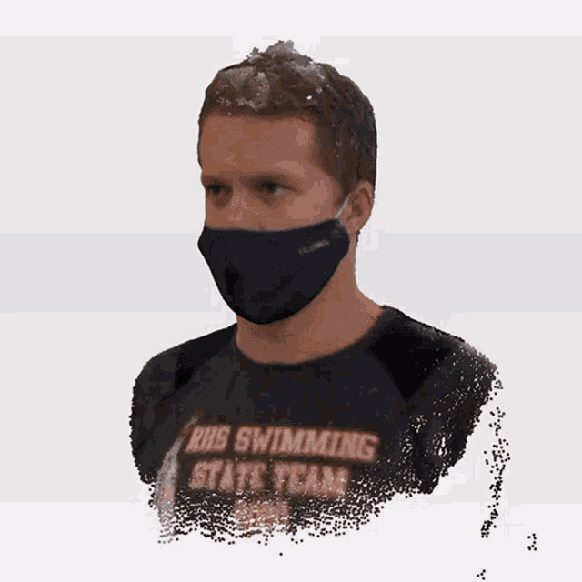 a man wearing a face mask and a shirt that says rhs swimming stats team