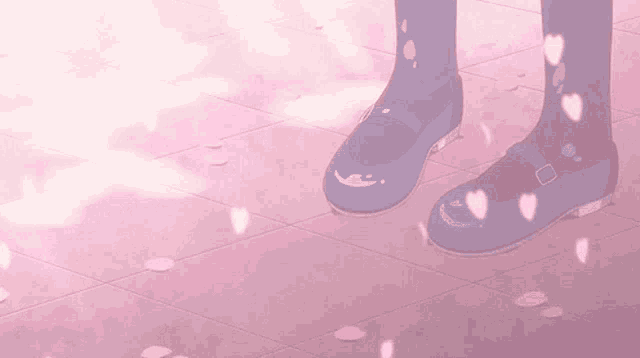 a pair of blue shoes standing on a pink tiled floor with petals falling from the sky