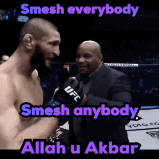 a man in a boxing ring with the words " smash everybody smash anybody allah u akbar " above him
