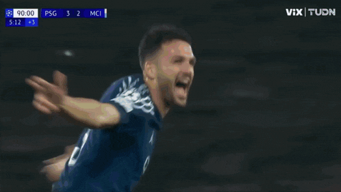 a soccer player is running on the field with his arms outstretched during a game .