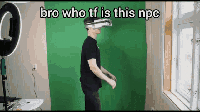 a man wearing a virtual reality headset with the words bro who tf is this npc below him