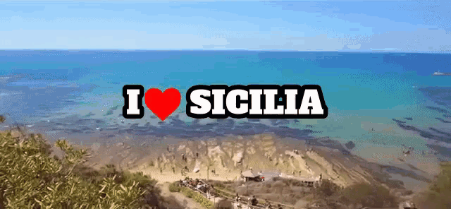 a sign that says i love sicilia with a heart