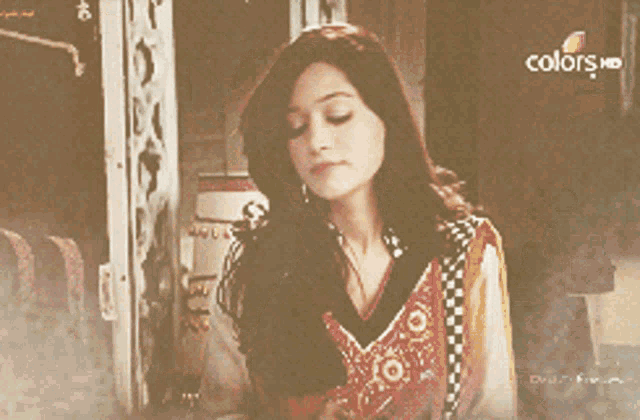 a blurred image of a woman with the words colors written on the bottom