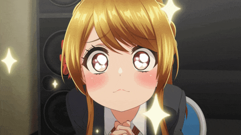 a close up of a girl 's face with a star on her forehead