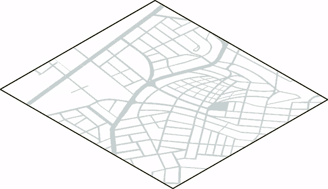 an aerial view of a city with a few buildings and trees