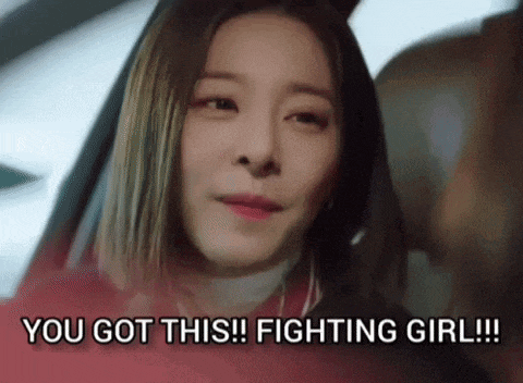 a woman is sitting in a car with the words you got this fighting girl