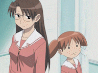 a girl with freckles is standing next to a girl with glasses
