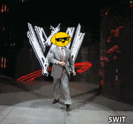 a man in a suit and tie is dancing in front of a wrestling logo